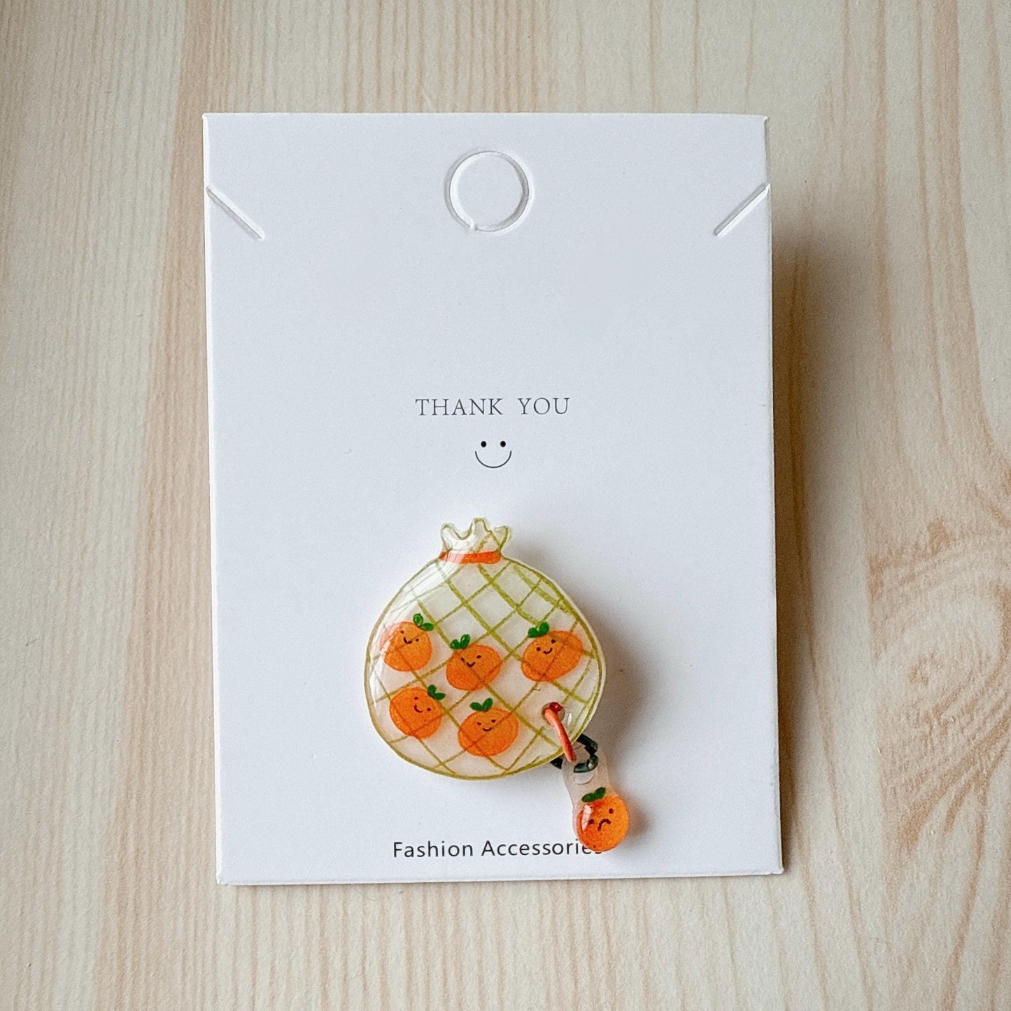 Orange pin