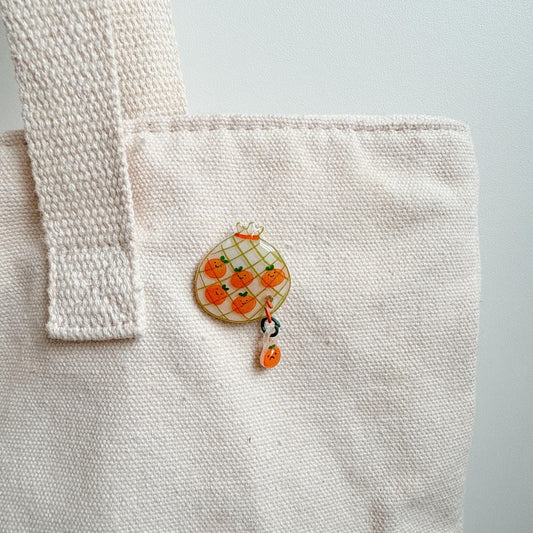 Orange pin